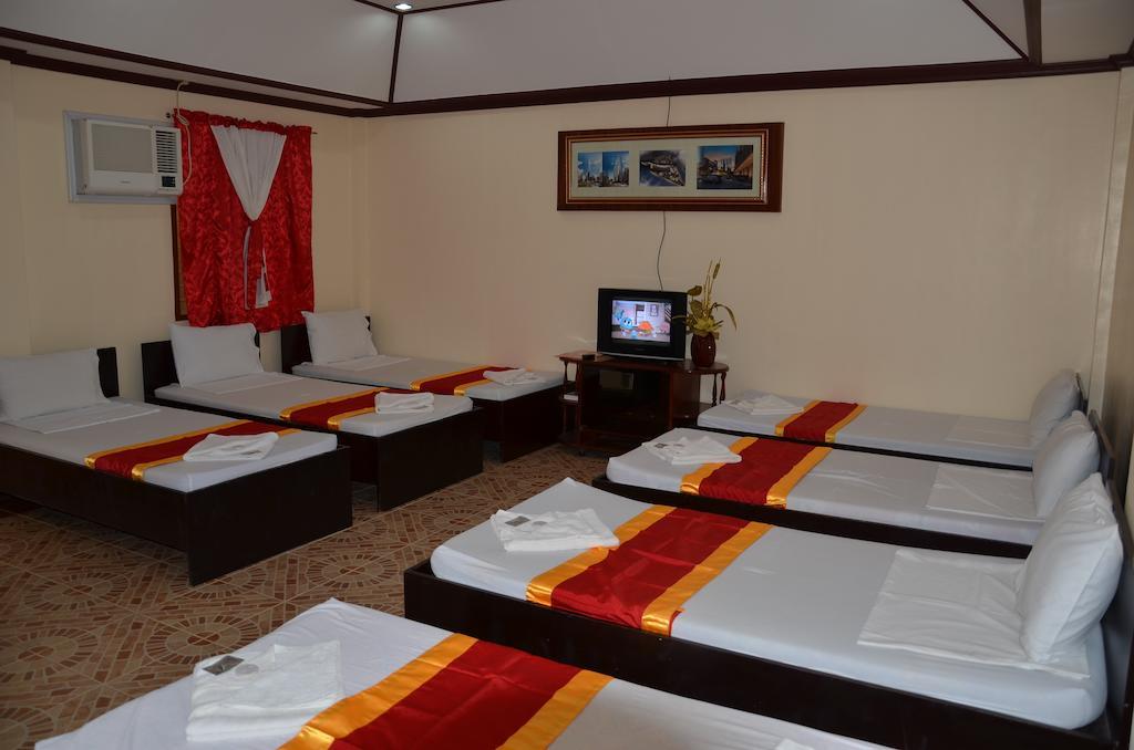Bed and Breakfast Ysabelle Mansion Puerto Princesa Pokoj fotografie