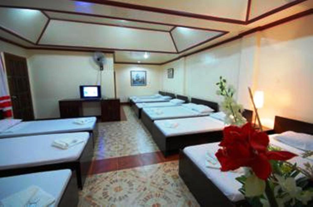 Bed and Breakfast Ysabelle Mansion Puerto Princesa Pokoj fotografie
