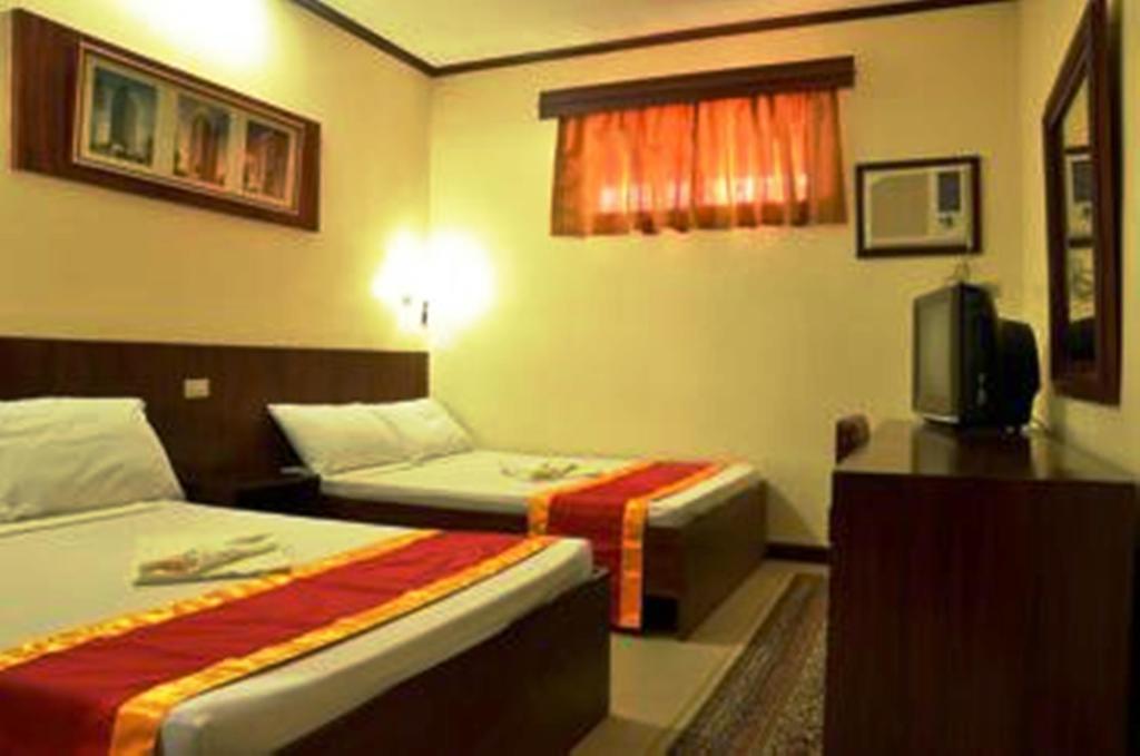 Bed and Breakfast Ysabelle Mansion Puerto Princesa Pokoj fotografie